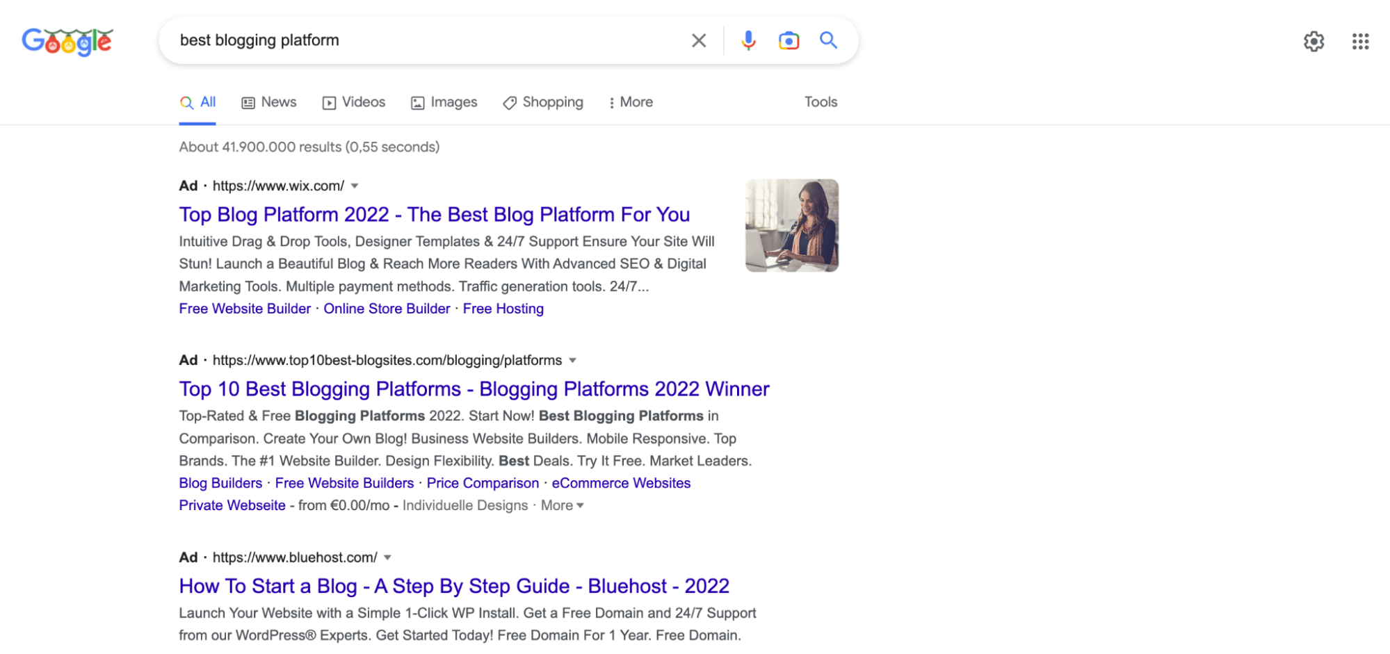 A screenshot of Google search results with three ads at the top of the SERP for the “best blogging platform” keyword