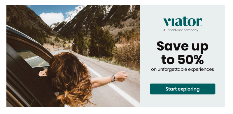 This image displays a picture of a woman hanging outside a car window on a mountain road. The advertisement states people can save up to 50% on unforgettable experiences with a button to start exploring.