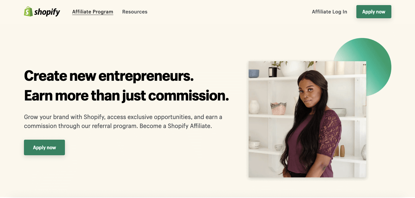 Screenshot of the Shopify Affiliate Program featuring a woman with a purple shirt with the tagline “Create new entrepreneurs. Earn more than just commission.”