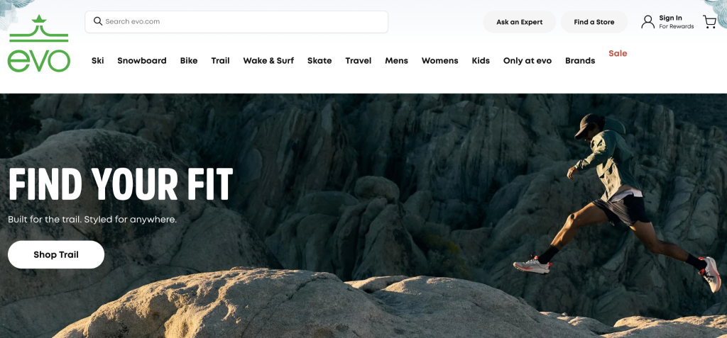 EVO homepage with the banner text “Find your fit” and a photo of a person jumping in the mountains