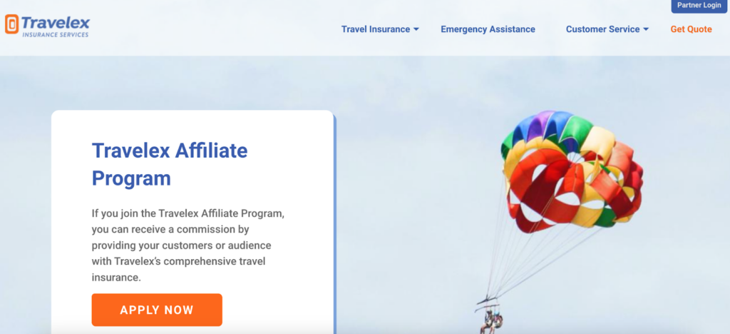 A screenshot of the Travelex affiliate program page featuring a parachute photo