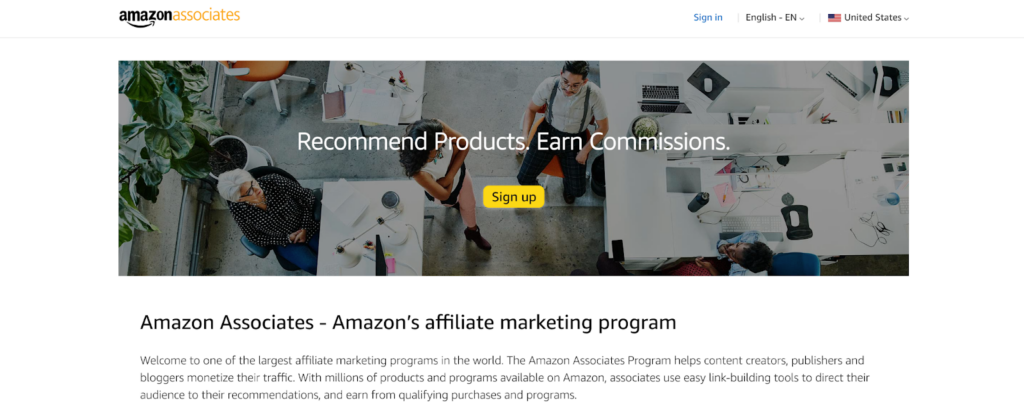 A screenshot of the Amazon Associates affiliate program page featuring a photo of an office from the top